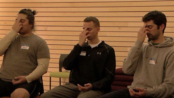 Photo of veterans practicing mindfulness via Free the Mind Documentary